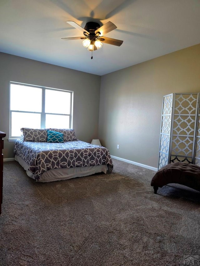 980 N Purcell Blvd, Pueblo West, CO 81007 - bedroom featuring baseboards, carpet flooring, and ceiling fan