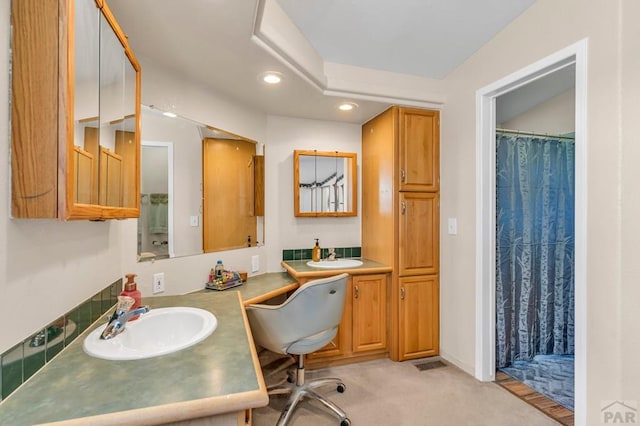 full bathroom with recessed lighting, visible vents, and vanity