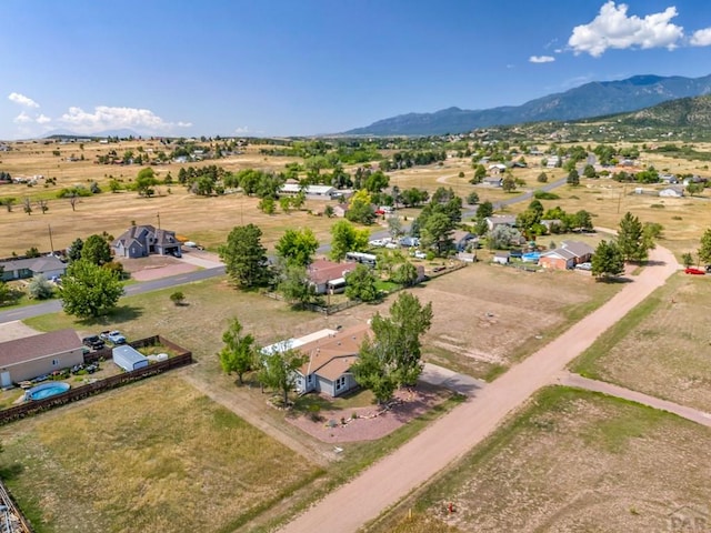 drone / aerial view featuring a mountain view