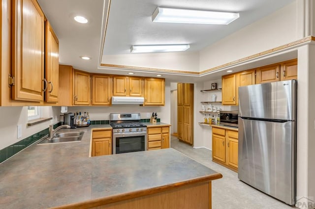 kitchen featuring vaulted ceiling, stainless steel appliances, under cabinet range hood, open shelves, and a sink