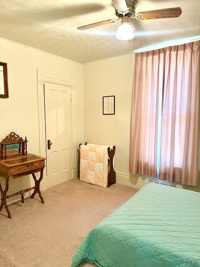602 Belleview Ave, La Junta, CO 81050 - carpeted bedroom featuring ceiling fan