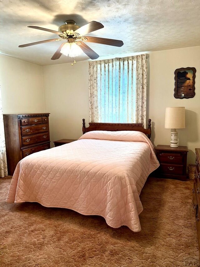 602 Belleview Ave, La Junta, CO 81050 - carpeted bedroom with ceiling fan