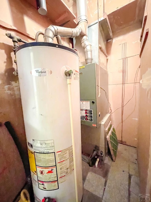 735 Poplar Ave, Las Animas, CO 81054 - utility room featuring water heater