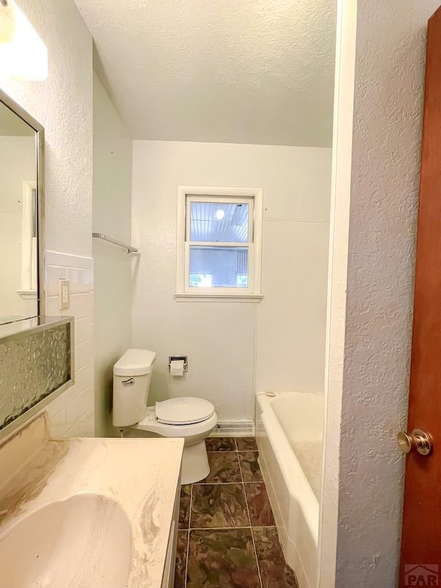 735 Poplar Ave, Las Animas, CO 81054 - bathroom with toilet and vanity