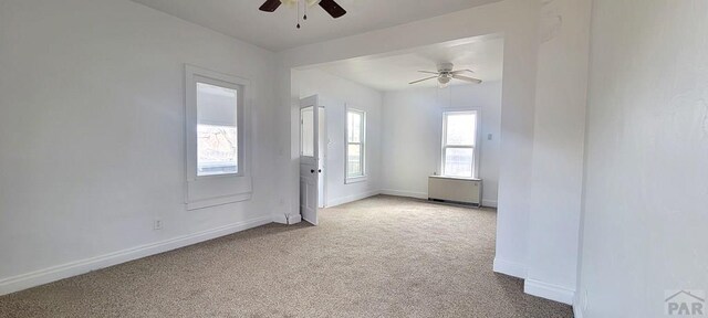 801 N Hendren Ave, Walsenburg, CO 81089 - empty room with ceiling fan, light carpet, and baseboards