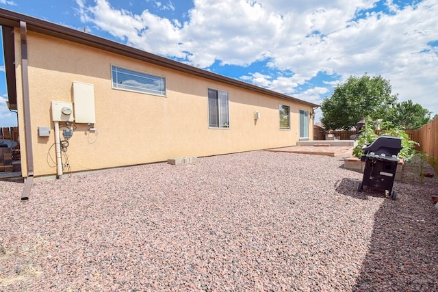 5707 Mark Twain Ln, Pueblo, CO 81008 - rear view of house with a patio area and stucco siding
