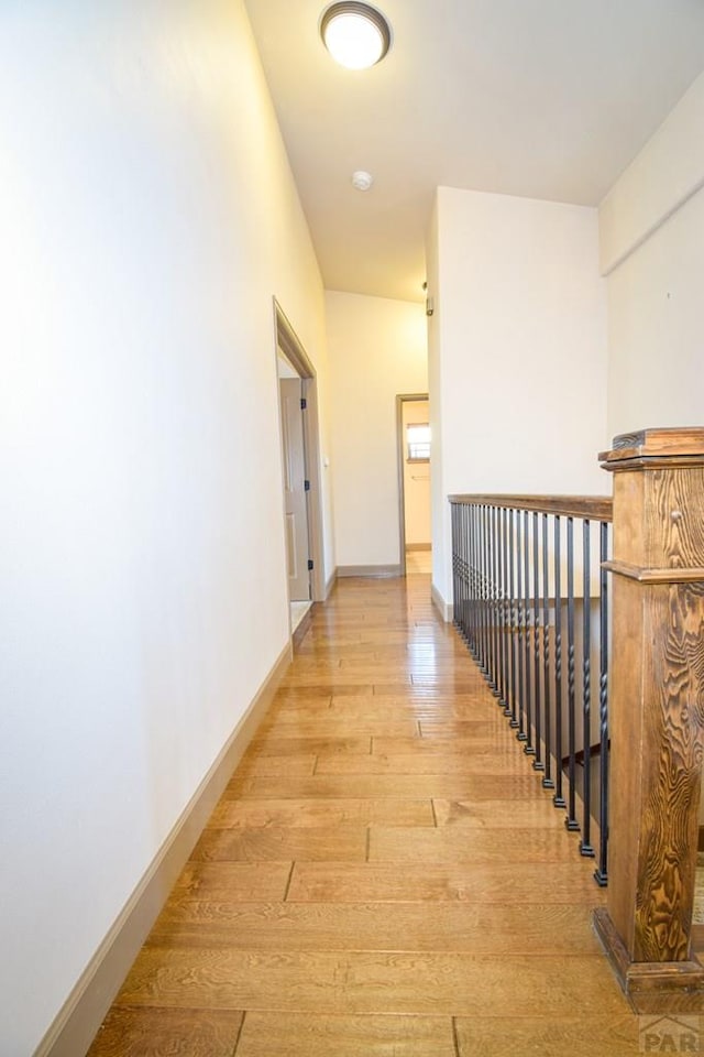 5707 Mark Twain Ln, Pueblo, CO 81008 - hall featuring light wood-style floors and baseboards