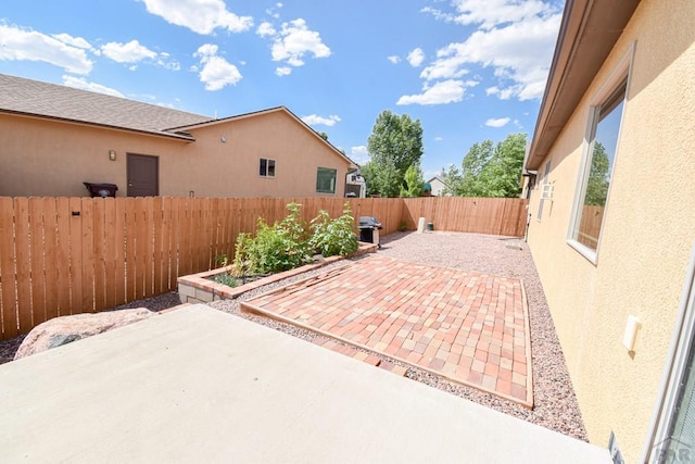 5707 Mark Twain Ln, Pueblo, CO 81008 - fenced backyard featuring a patio area