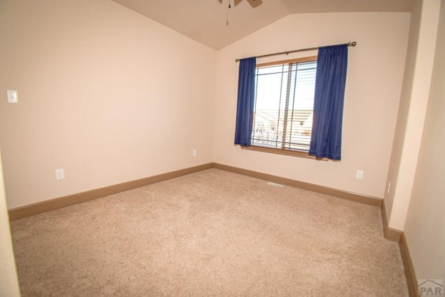 5707 Mark Twain Ln, Pueblo, CO 81008 - empty room featuring vaulted ceiling, carpet floors, and ceiling fan