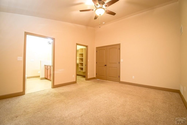 5707 Mark Twain Ln, Pueblo, CO 81008 - empty room featuring a ceiling fan and light carpet