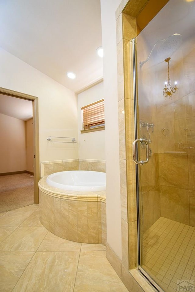5707 Mark Twain Ln, Pueblo, CO 81008 - full bathroom with a bath, a stall shower, a chandelier, and recessed lighting