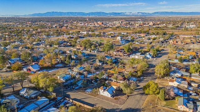 bird's eye view featuring a residential view and a mountain view