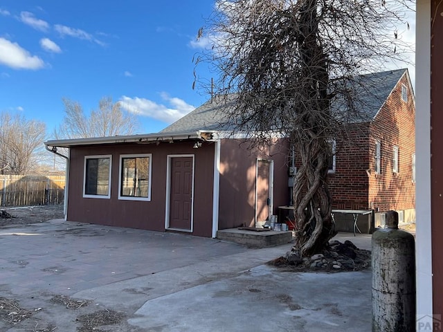 exterior space with a patio area and fence