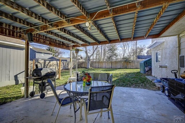 view of patio / terrace featuring outdoor dining area, a fenced backyard, and area for grilling