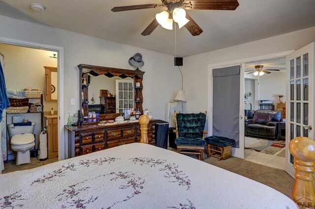 bedroom featuring a ceiling fan and light tile patterned flooring