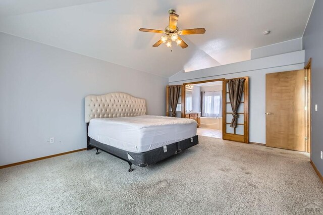 bedroom featuring lofted ceiling, a ceiling fan, baseboards, and carpet flooring