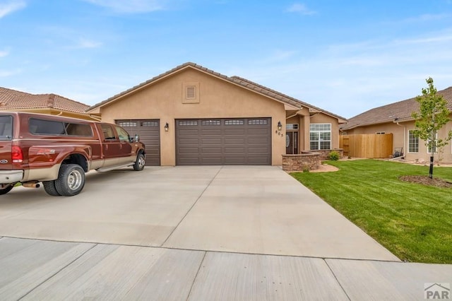 ranch-style home with stucco siding, a front yard, fence, a garage, and driveway