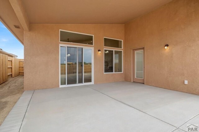 view of patio with fence