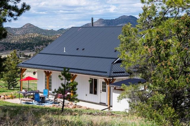 311 Knickerbocker Rd, Silver Cliff, CO 81252 - back of property with a mountain view and a patio area