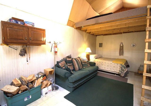 bedroom featuring wooden walls