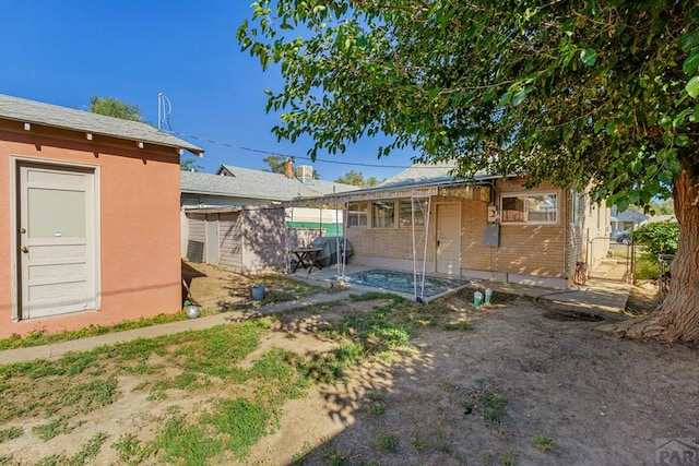 1908 E 5th St, Pueblo, CO 81001 - view of yard with a patio