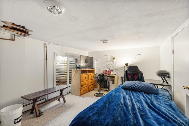1908 E 5th St, Pueblo, CO 81001 - bedroom featuring light colored carpet and a textured ceiling