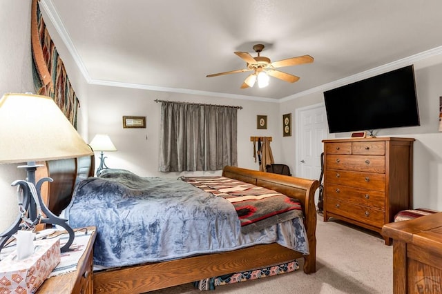 bedroom with a ceiling fan, crown molding, and light colored carpet