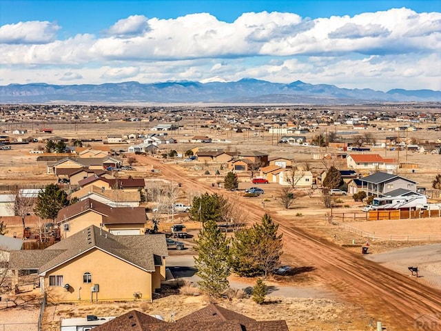 birds eye view of property featuring a residential view and a mountain view