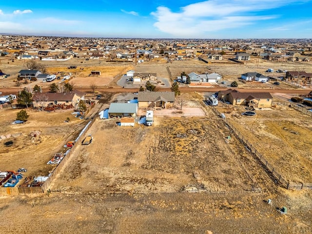 birds eye view of property with a residential view