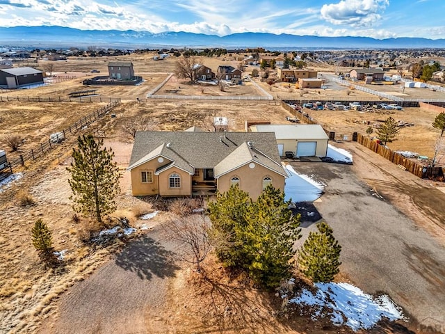 drone / aerial view featuring a mountain view