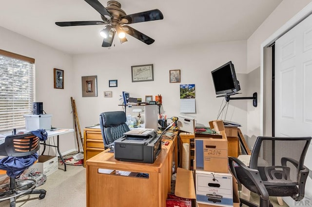 office area with light carpet and a ceiling fan