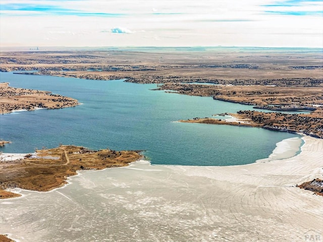 drone / aerial view featuring a water view