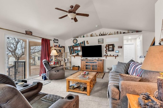 living room featuring vaulted ceiling, ceiling fan, and carpet flooring