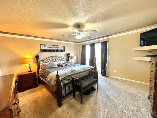 bedroom featuring crown molding, light colored carpet, a ceiling fan, a textured ceiling, and baseboards