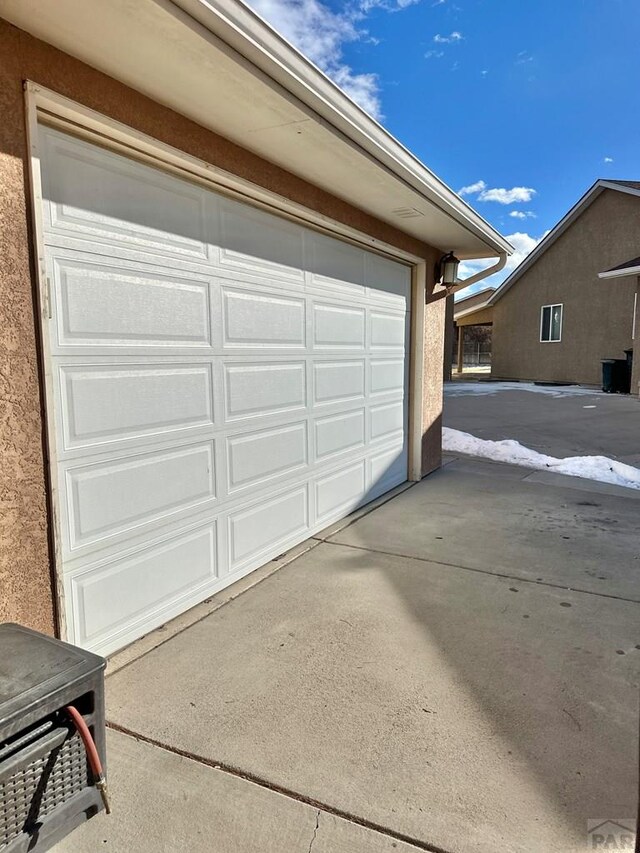 garage with driveway