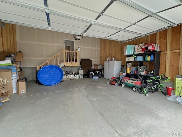 4805 Walking Stick Blvd, Pueblo, CO 81001 - garage with a garage door opener and washer / clothes dryer