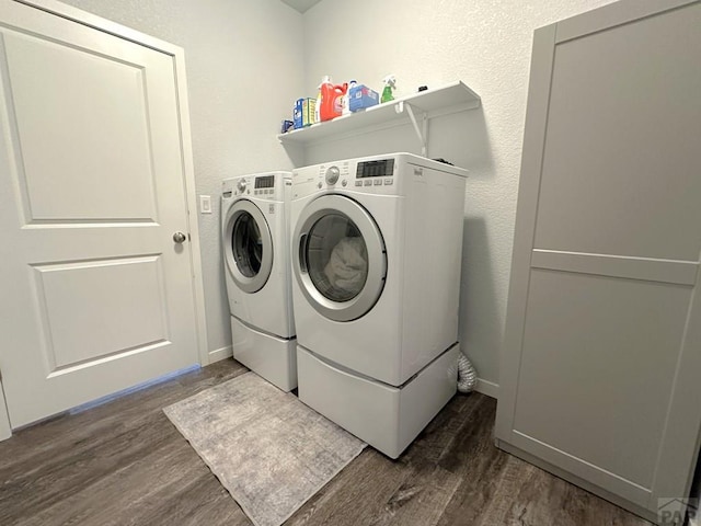 4805 Walking Stick Blvd, Pueblo, CO 81001 - laundry area featuring independent washer and dryer, dark wood-type flooring, and baseboards