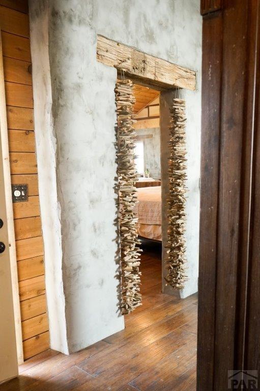 hallway featuring wood finished floors